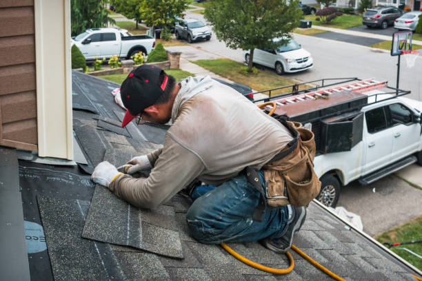 Professional Roofing technician working in Old Monroe, MO